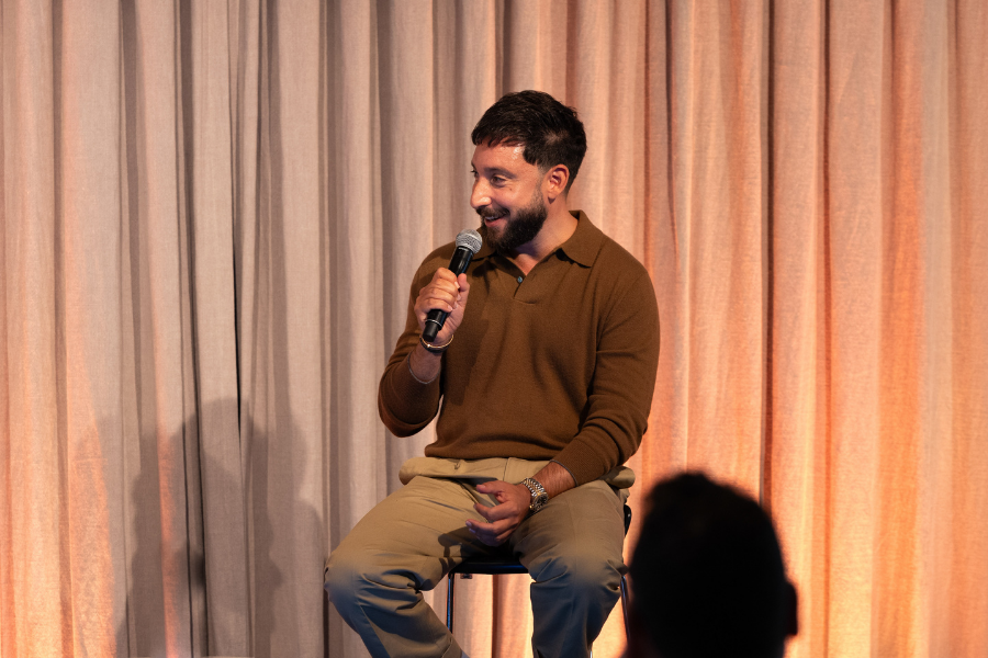 Speaker on stage at a client event